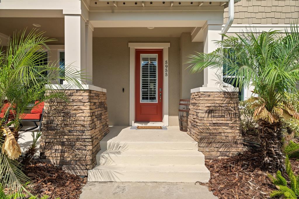 5955 Caldera Ridge Drive Lithia, FL 33547 - Photo 6 of 71 a front view of a house with a yard