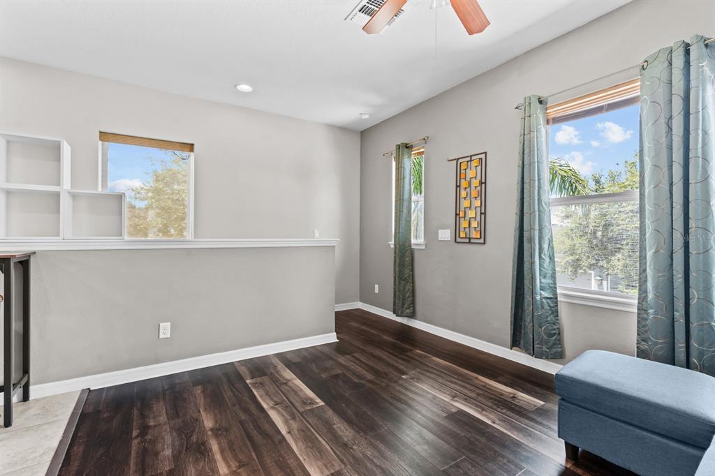5955 Caldera Ridge Drive Lithia, FL 33547 - Photo 68 of 71 a bedroom with a bed and a window