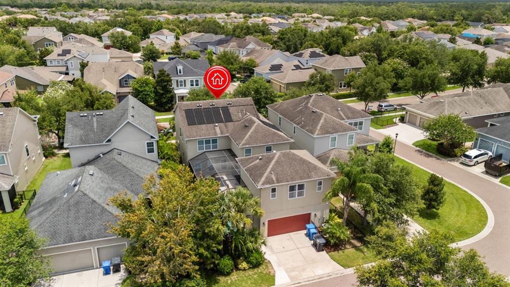 5955 Caldera Ridge Drive Lithia, FL 33547 - Photo 9 of 71 an aerial view of a house with a garden