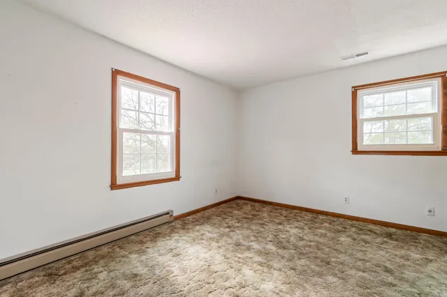 an empty room with a window