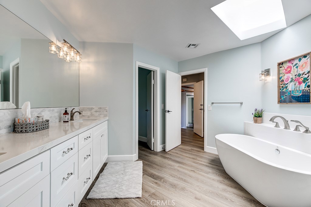 33531 Marlinspike Drive Dana Point, CA 92629 - Photo 22 of 52 a bathroom with a double vanity sink and a mirror