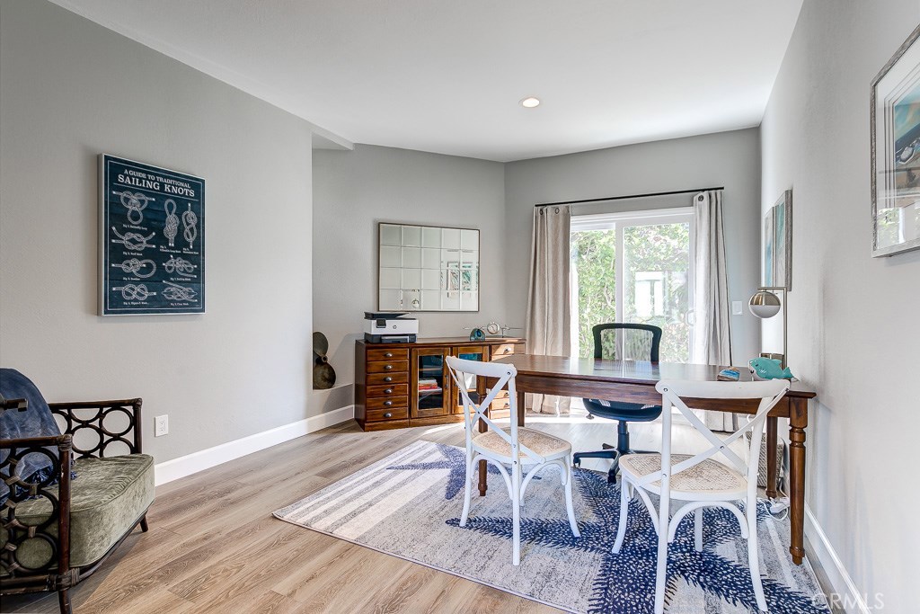 33531 Marlinspike Drive Dana Point, CA 92629 - Photo 23 of 52 a living room with furniture and a wooden floor