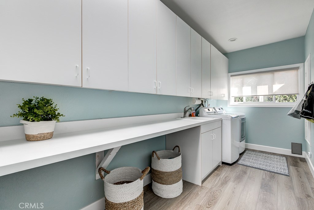 33531 Marlinspike Drive Dana Point, CA 92629 - Photo 24 of 52 a kitchen with a sink and cabinets