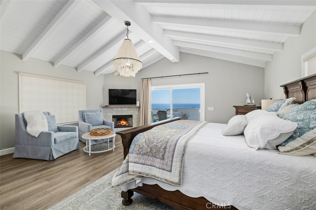 33531 Marlinspike Drive Dana Point, CA 92629 - Photo 45 of 52 a bedroom with a bed and a flat screen tv