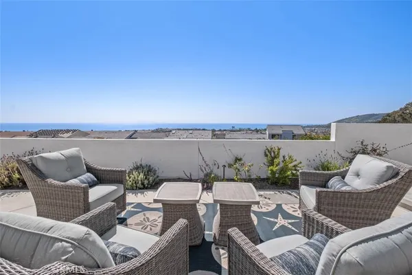 a view of a balcony with lake view and mountain view