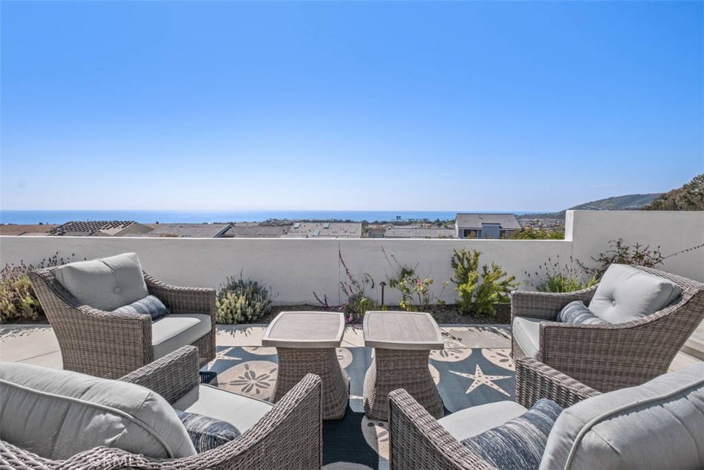 33531 Marlinspike Drive Dana Point, CA 92629 - Photo 47 of 52 a balcony with furniture and city view