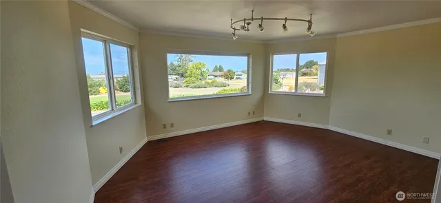 an empty room with windows