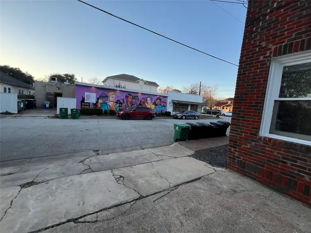 a car parked in front of a building