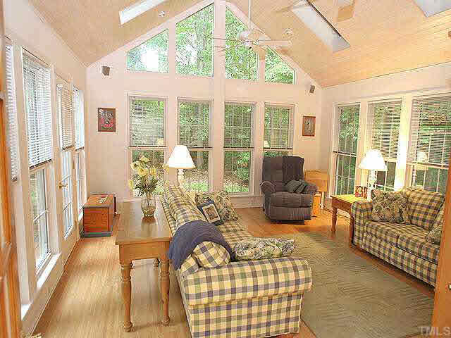 3012 Oxbow Court Raleigh, NC 27613 - Photo 6 of 9 a living room with furniture or couch and a large window