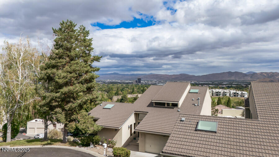 2220 Stone Mountain Circle Reno, NV 89519 - Photo 2 of 58 an aerial view of residential houses with yard