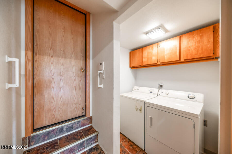 2220 Stone Mountain Circle Reno, NV 89519 - Photo 38 of 58 a bathroom with a sink a toilet and a mirror
