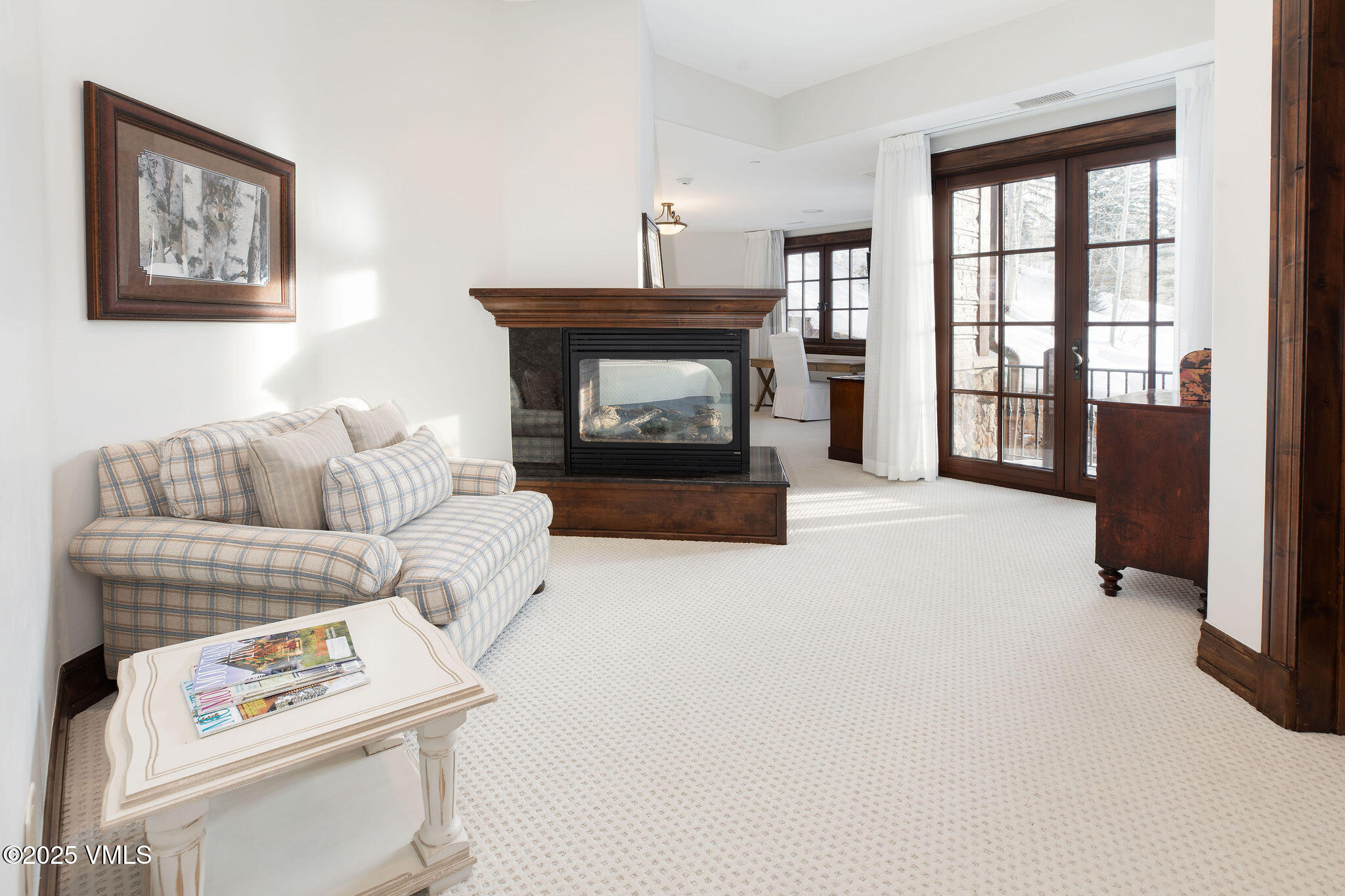 2195 Cresta Road Edwards, CO 81632 - Photo 17 of 43 a living room with furniture and a fireplace