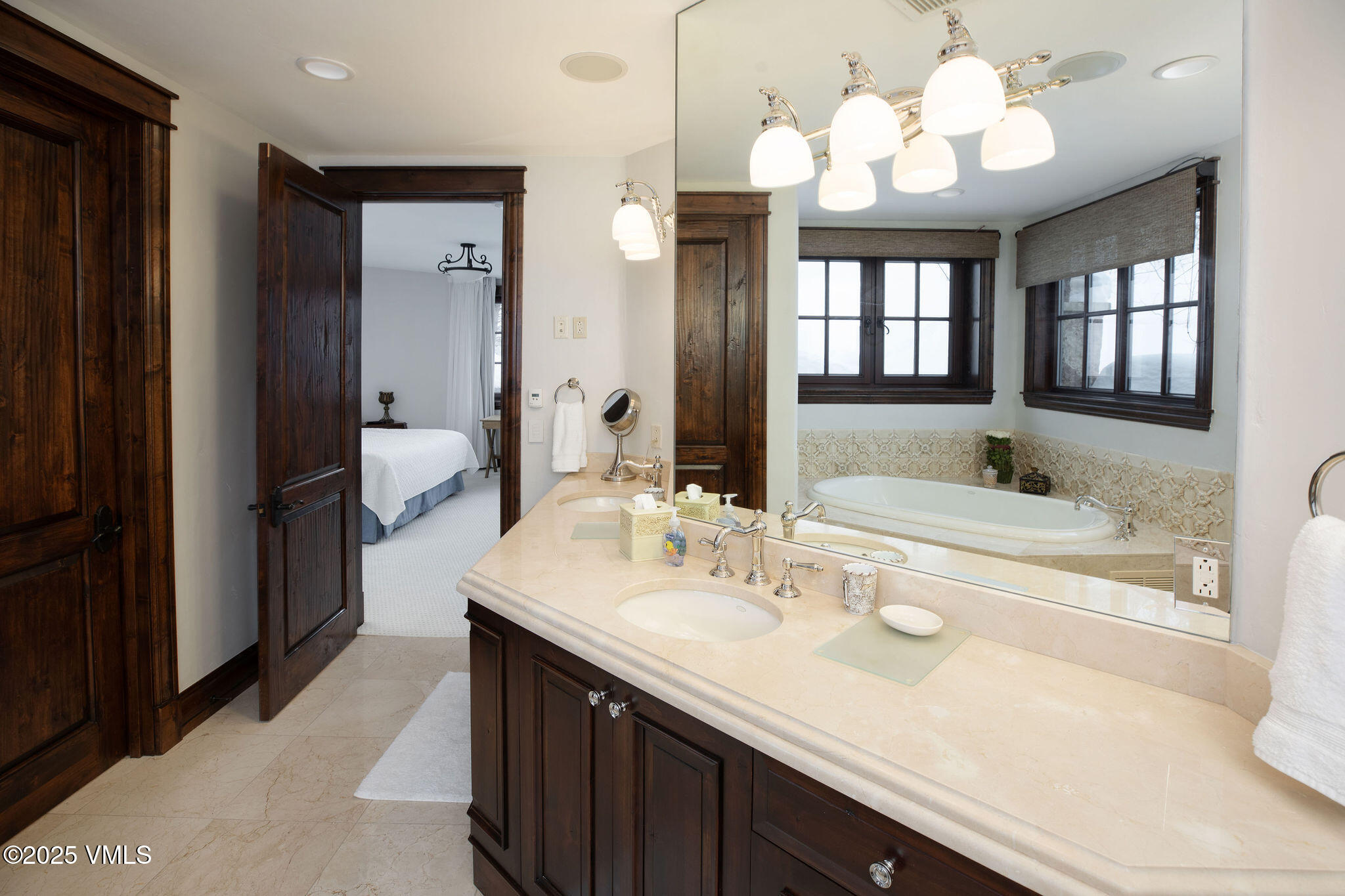 2195 Cresta Road Edwards, CO 81632 - Photo 29 of 43 a bathroom with a sink double vanity and a mirror