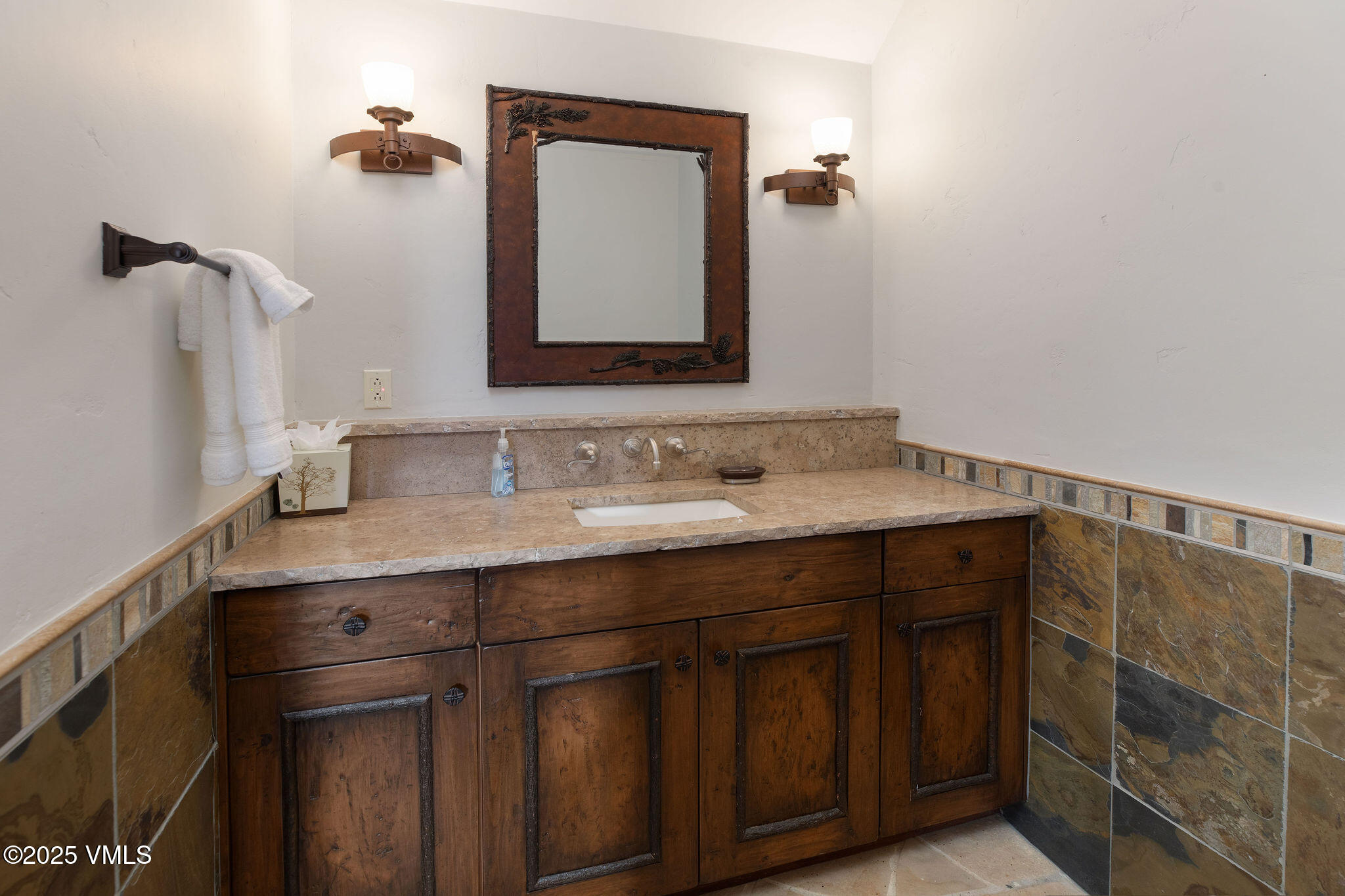 2195 Cresta Road Edwards, CO 81632 - Photo 31 of 43 a bathroom with a sink vanity and mirror