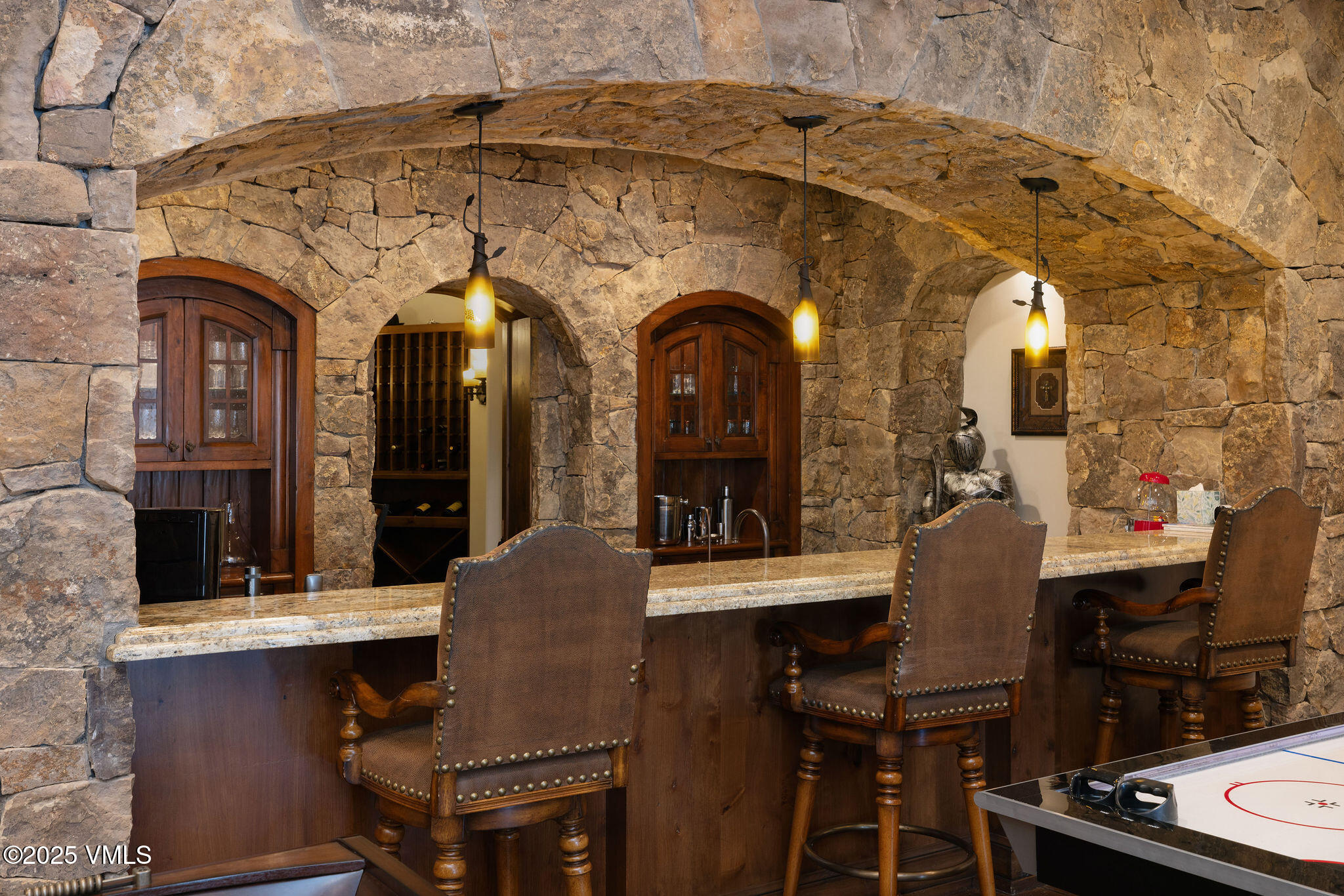 2195 Cresta Road Edwards, CO 81632 - Photo 6 of 43 a view of a dining room with furniture and chandelier