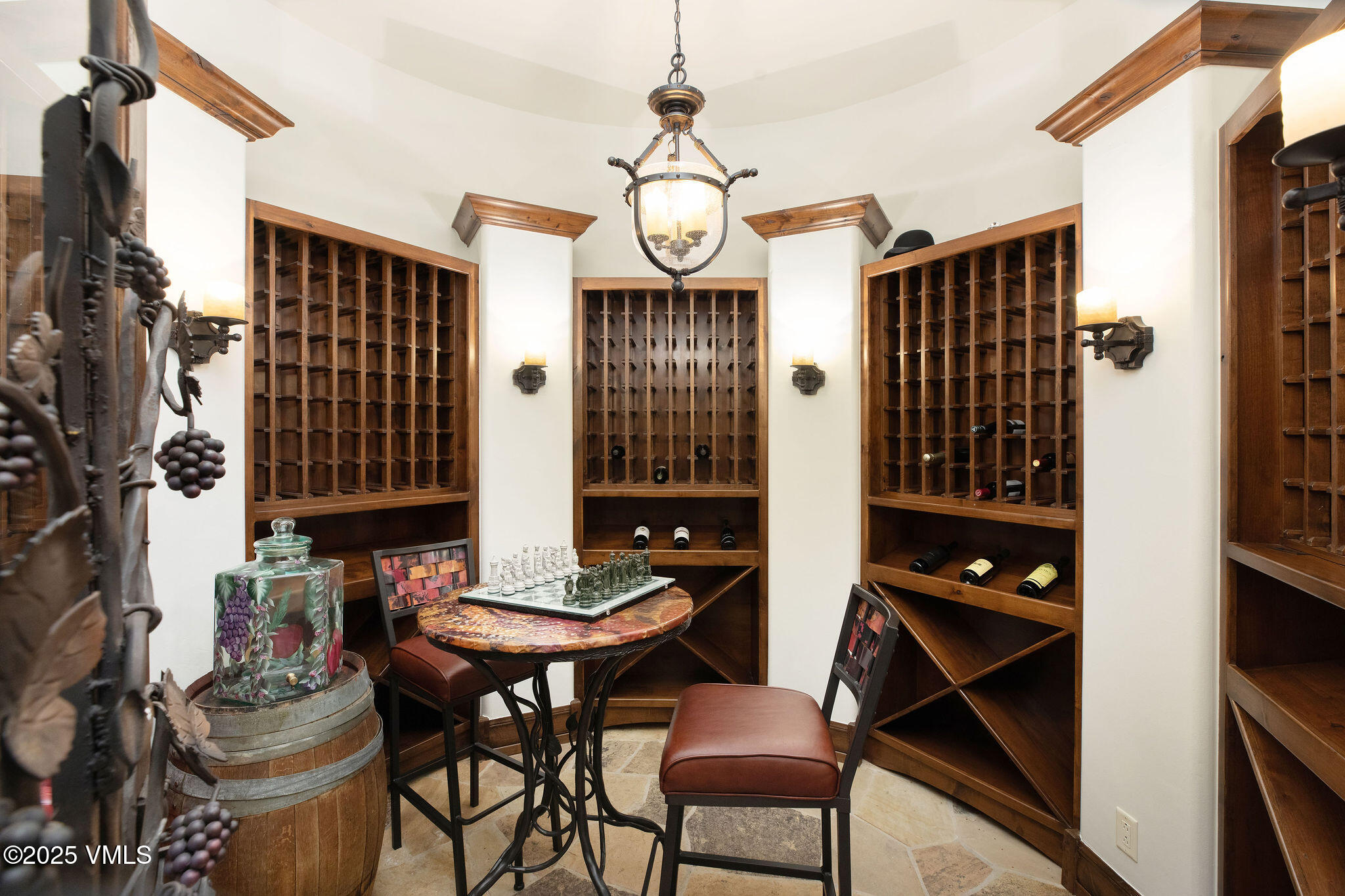 2195 Cresta Road Edwards, CO 81632 - Photo 7 of 43 a view of a dining room with furniture and chandelier