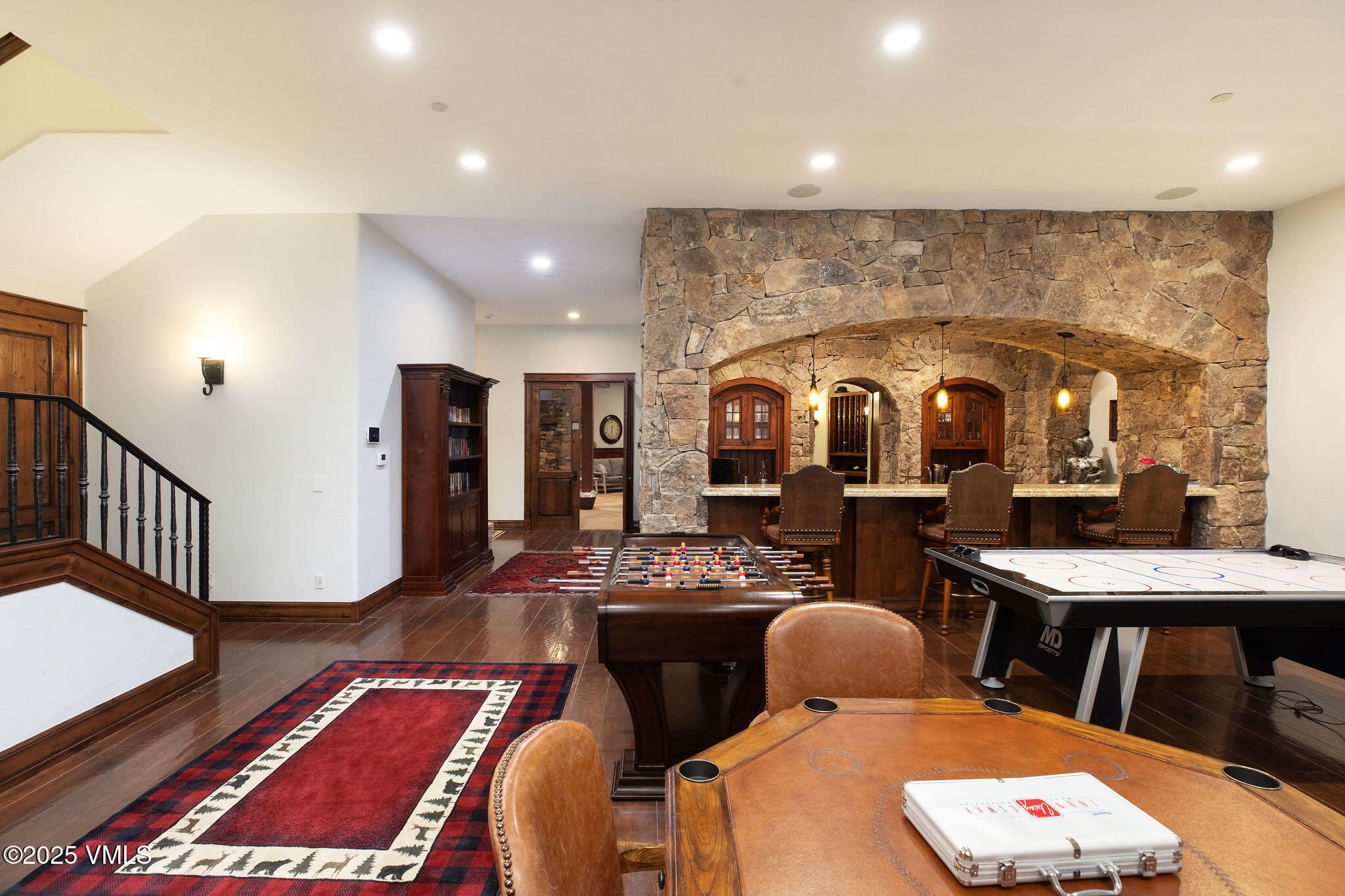 2195 Cresta Road Edwards, CO 81632 - Photo 8 of 43 a living room with furniture a rug and a table