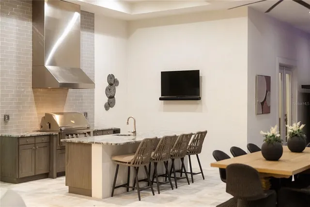 a bathroom with a toilet a sink a mirror and a shower