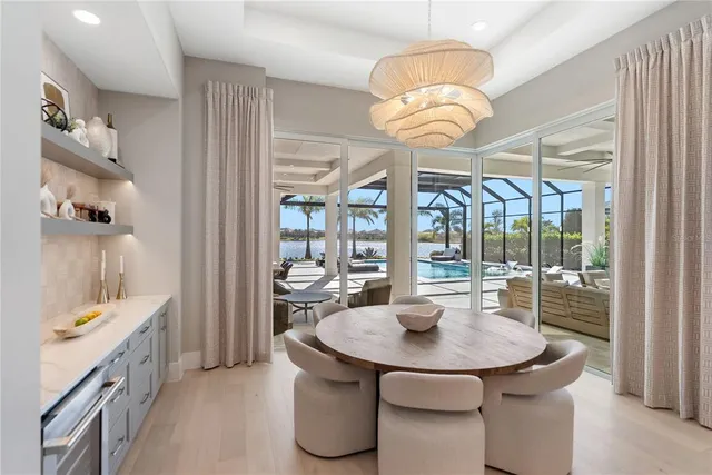 a view of a swimming pool with a patio