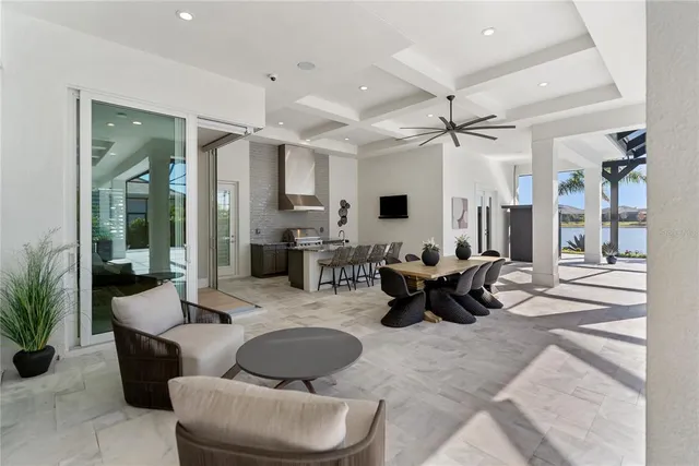 a kitchen with stainless steel appliances granite countertop a sink and a stove top oven