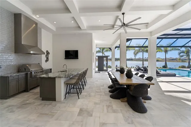 an aerial view of a house with a lake view