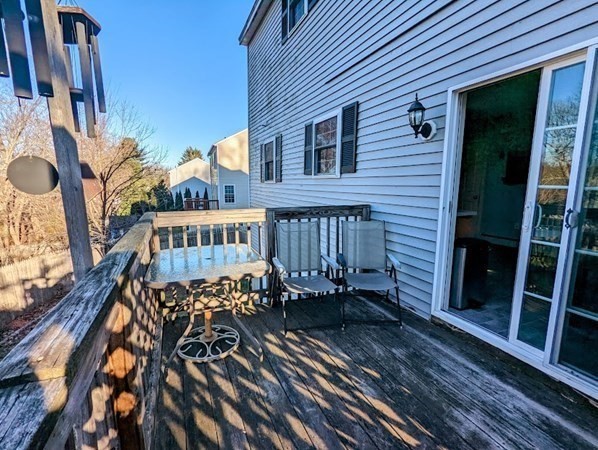 26 El Caney Road Worcester, MA 01603 - Photo 27 of 37 a view of balcony with wooden floor