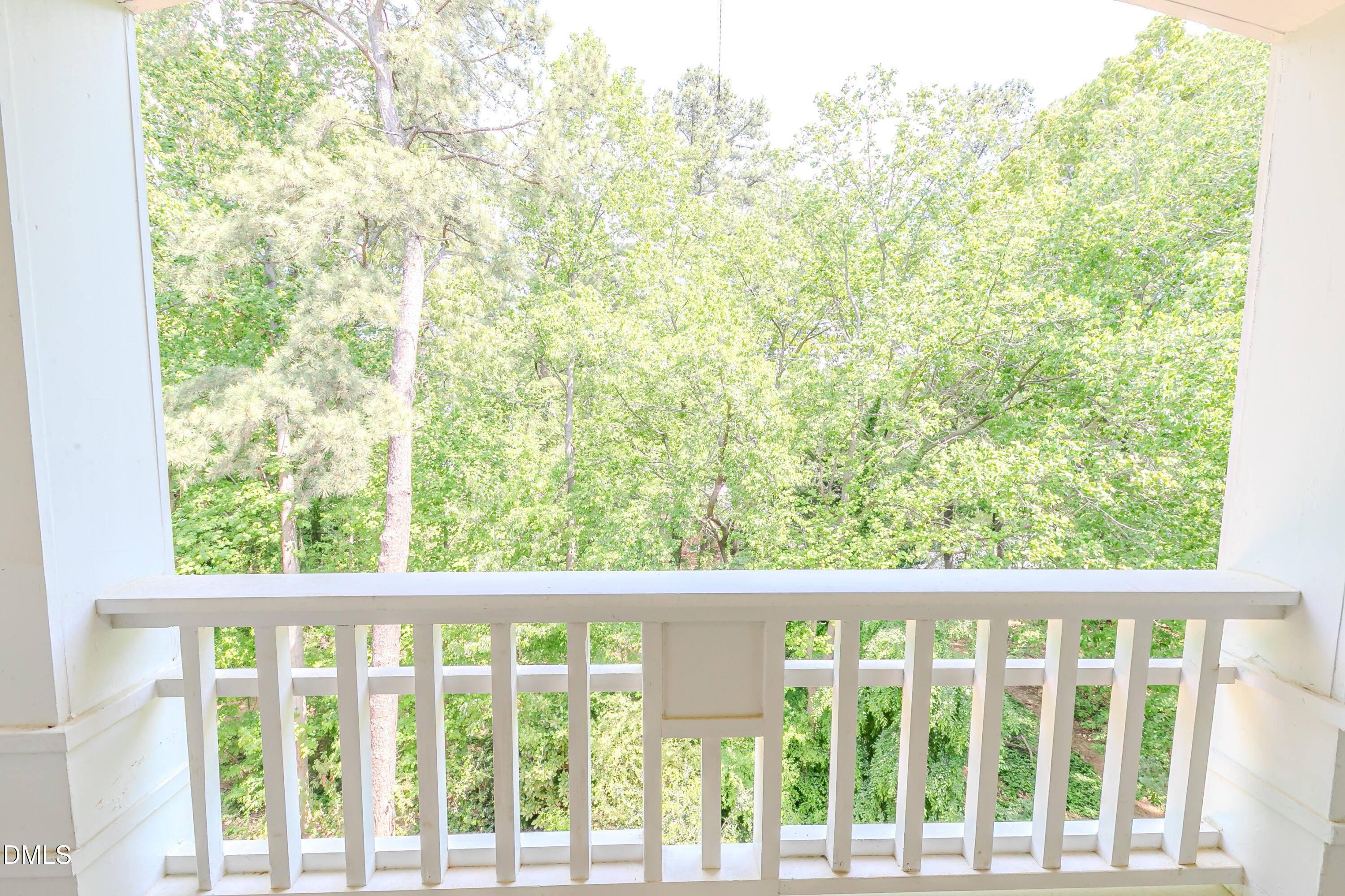 116 Northbrook Drive, Unit 305 Raleigh, NC 27609 - Photo 24 of 43 a view of a large window with a small yard