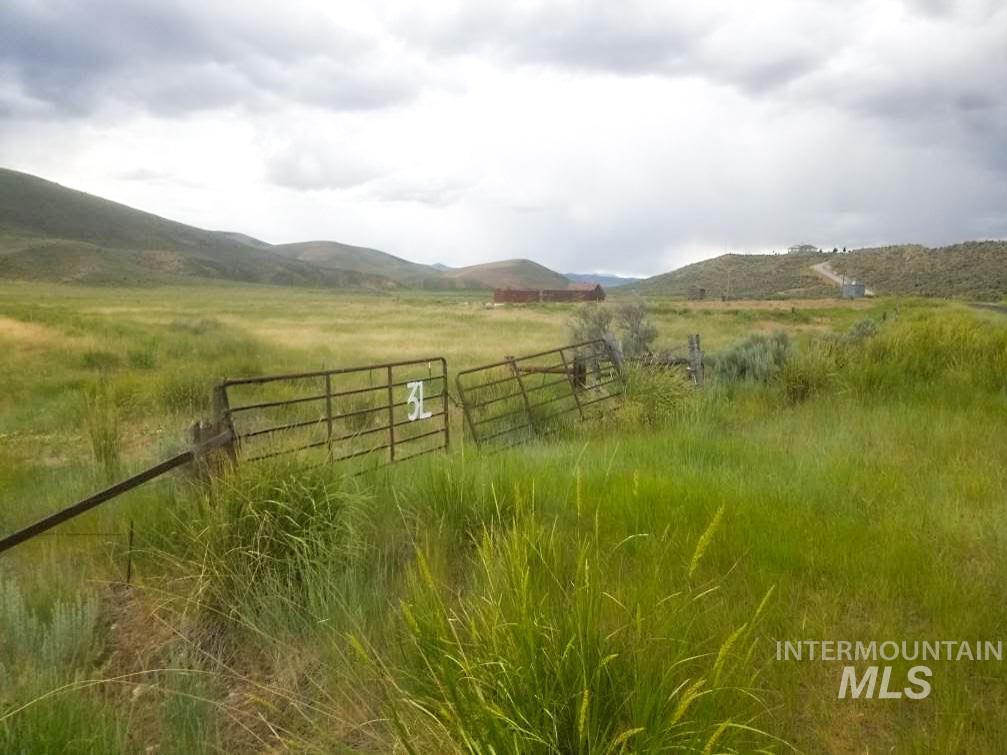 North Daniels Road Malad City, ID 83252 - Photo 7 of 8 View of yard featuring a view of rural / pastoral area and a mountain view