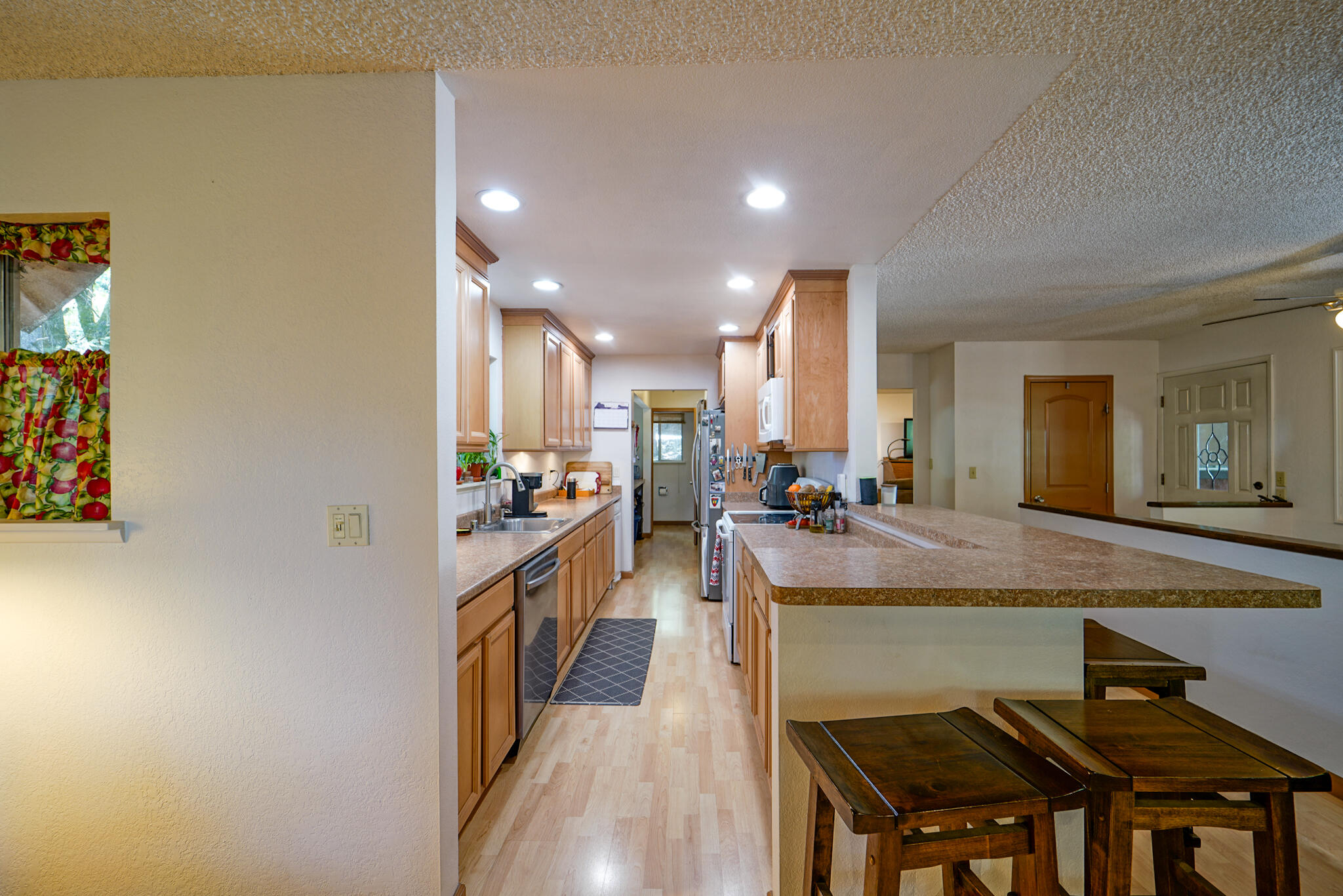 500 Timber Ridge Road Weaverville, CA 96093 - Photo 14 of 61 a large kitchen with a table and chairs