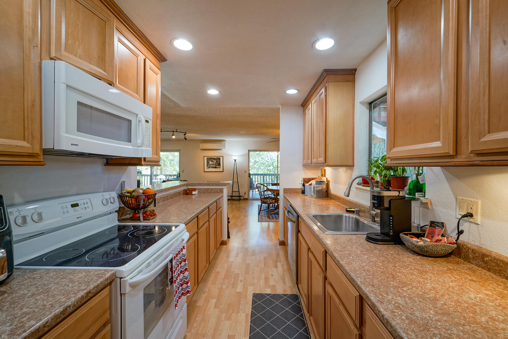 500 Timber Ridge Road Weaverville, CA 96093 - Photo 16 of 61 a kitchen that has a lot of cabinets in it