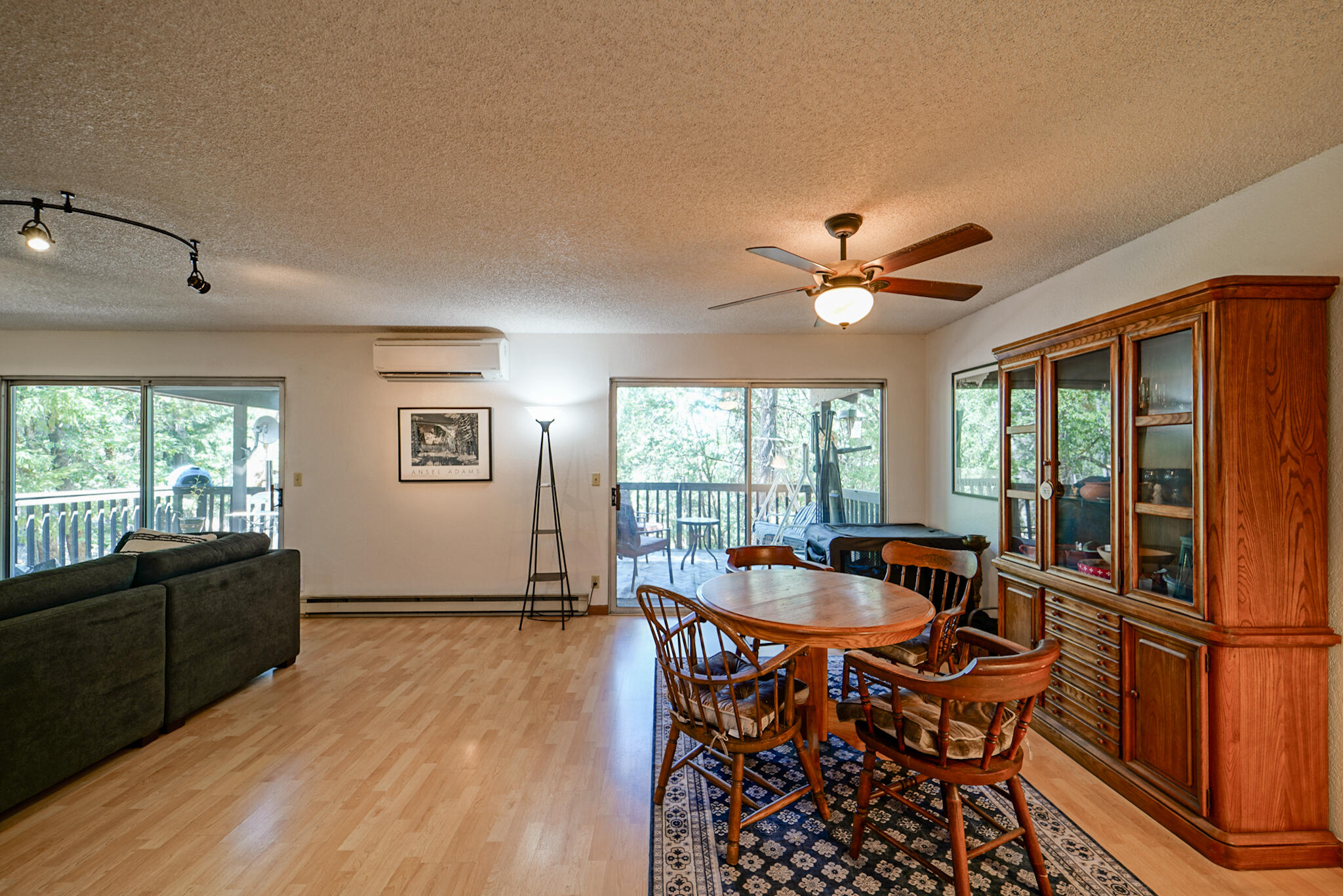 500 Timber Ridge Road Weaverville, CA 96093 - Photo 17 of 61 a dining room with furniture a chandelier and wooden floor