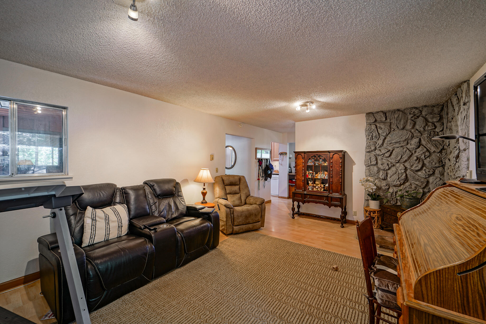 500 Timber Ridge Road Weaverville, CA 96093 - Photo 25 of 61 a living room with furniture and a window
