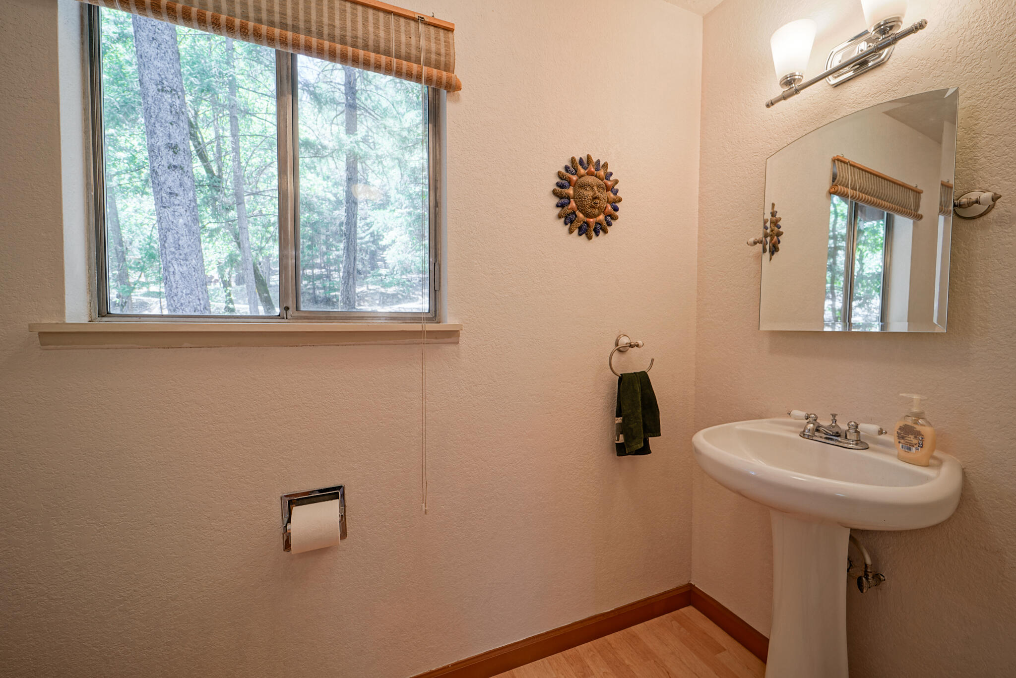 500 Timber Ridge Road Weaverville, CA 96093 - Photo 26 of 61 a bathroom with a sink a mirror and a window
