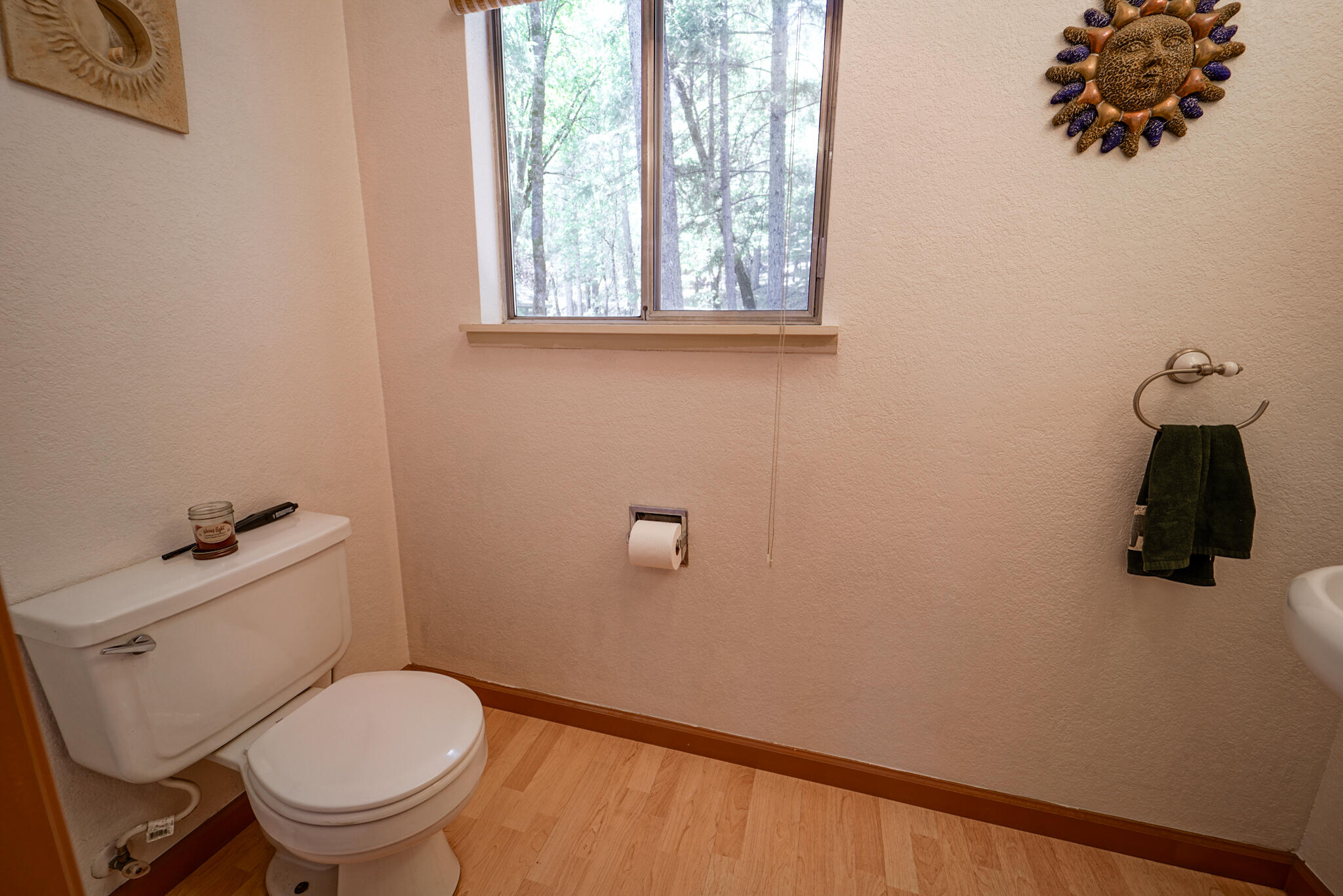 500 Timber Ridge Road Weaverville, CA 96093 - Photo 27 of 61 a white toilet sitting next to a window