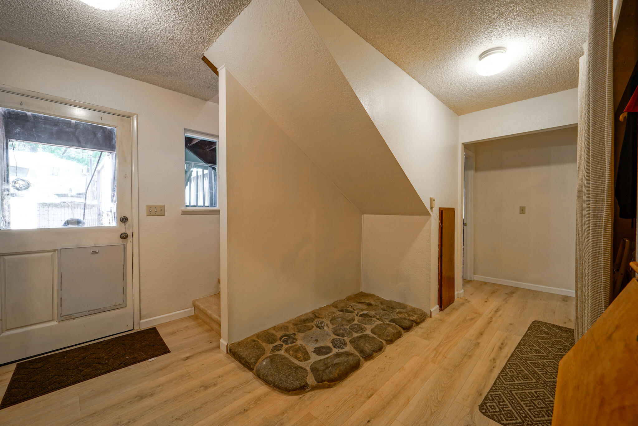 500 Timber Ridge Road Weaverville, CA 96093 - Photo 32 of 61 a bedroom with a bed and a window