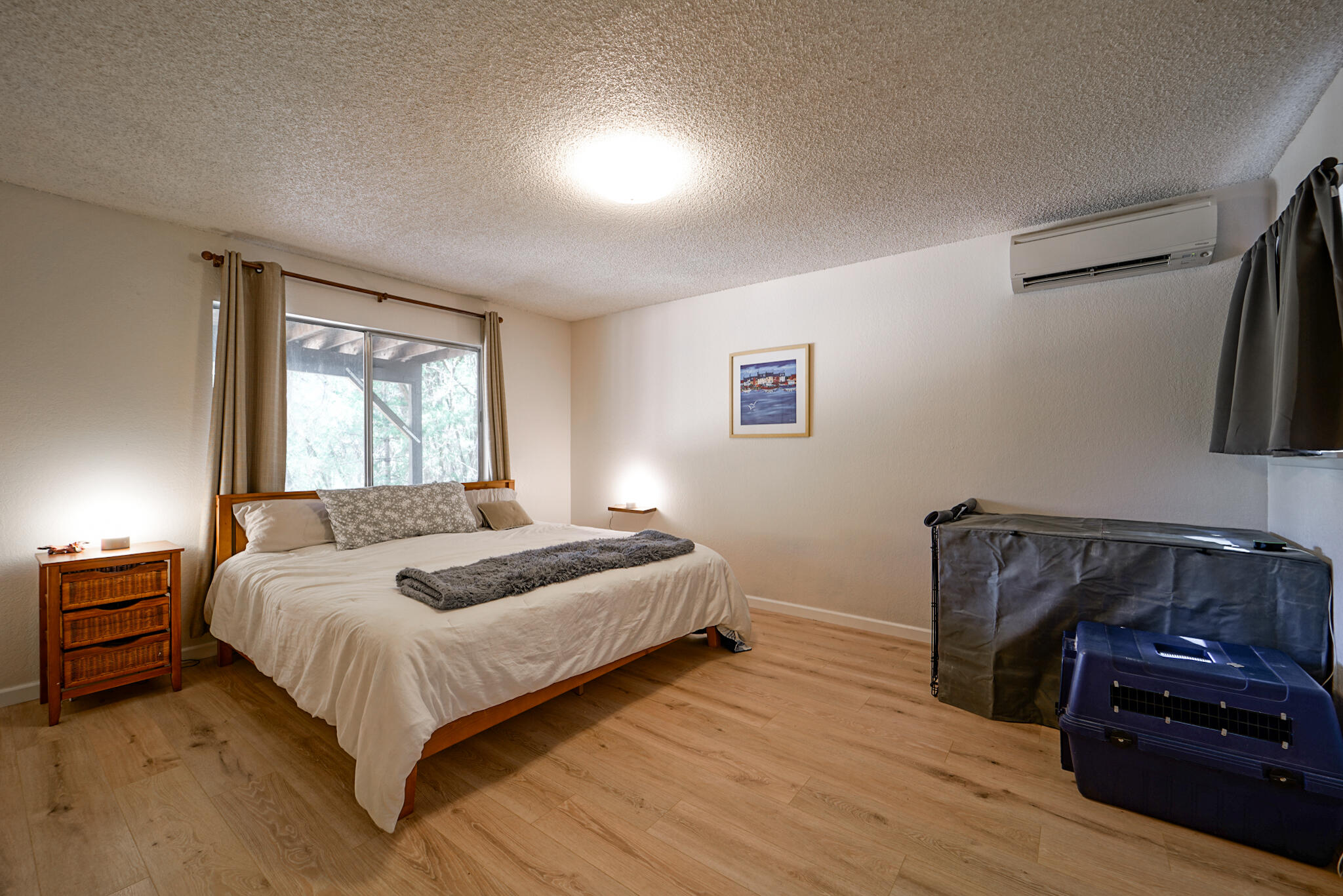 500 Timber Ridge Road Weaverville, CA 96093 - Photo 34 of 61 a bedroom with a bed and a mirror