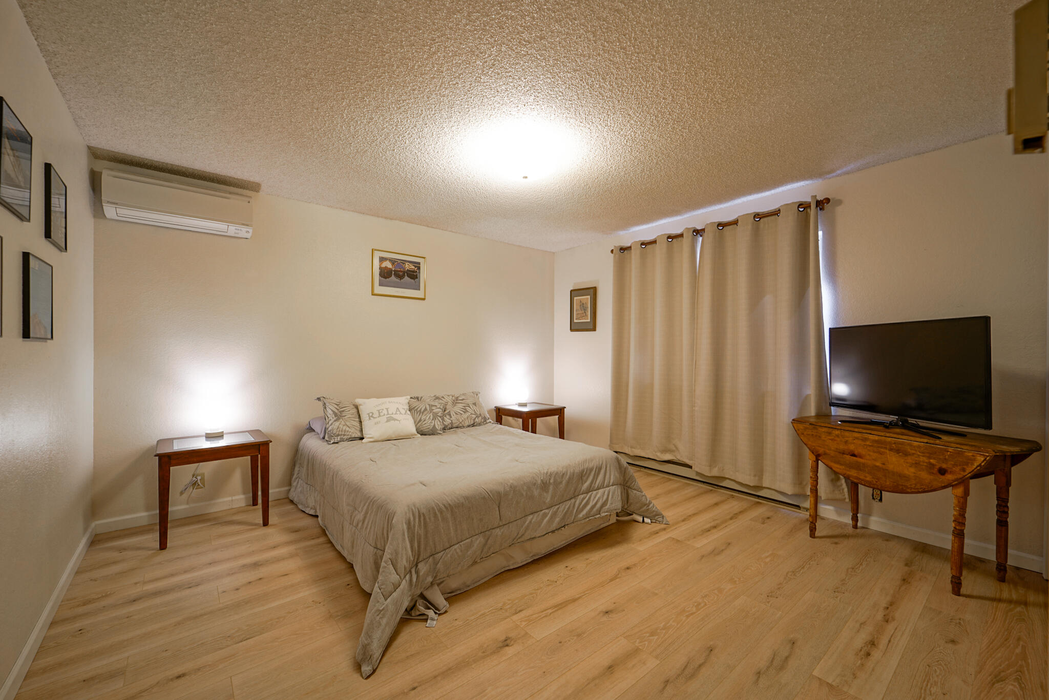 500 Timber Ridge Road Weaverville, CA 96093 - Photo 38 of 61 a bedroom with a bed and a flat screen tv