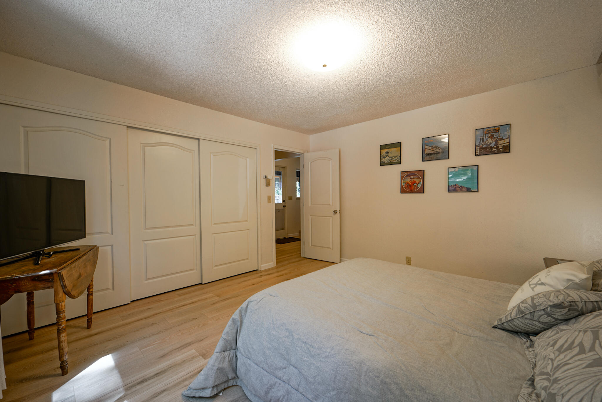 500 Timber Ridge Road Weaverville, CA 96093 - Photo 40 of 61 a bedroom with a bed and a flat screen tv