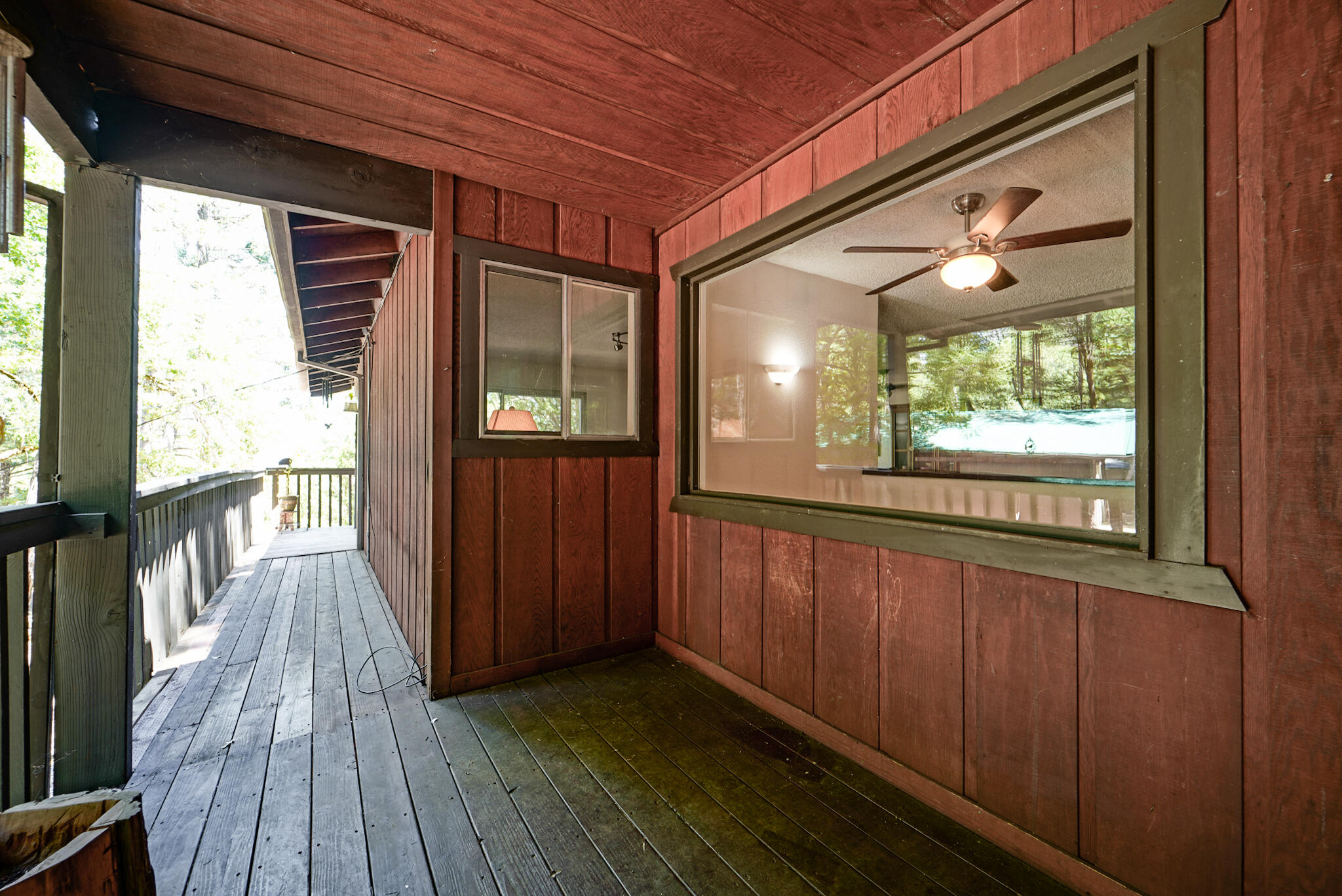 500 Timber Ridge Road Weaverville, CA 96093 - Photo 7 of 61 a view of a porch with wooden floor and outdoor space