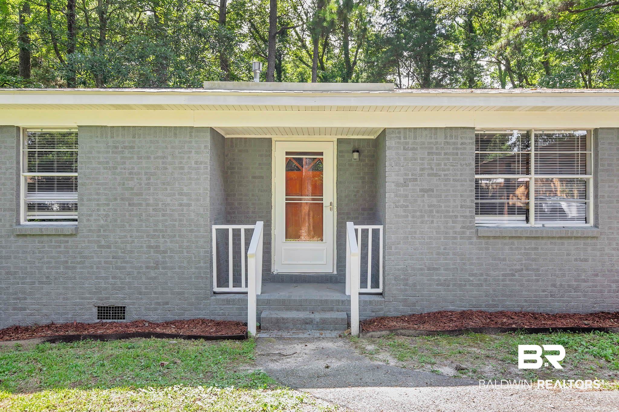 3304 Armond Drive Mobile, AL 36605 - Photo 5 of 62 Entrance to property with crawl space and brick siding