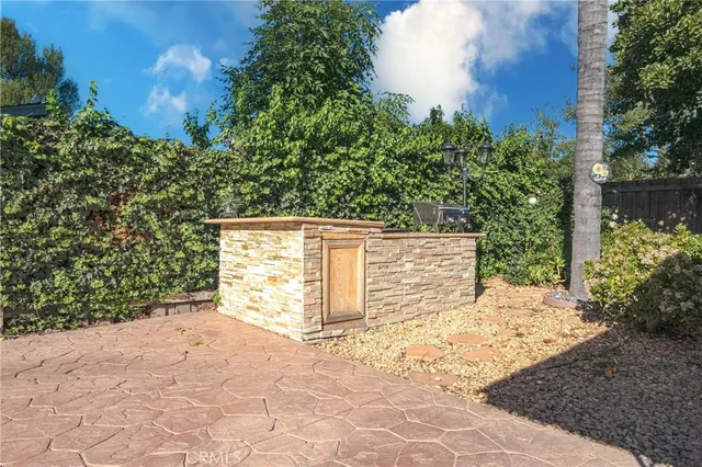 a view of a backyard of the house