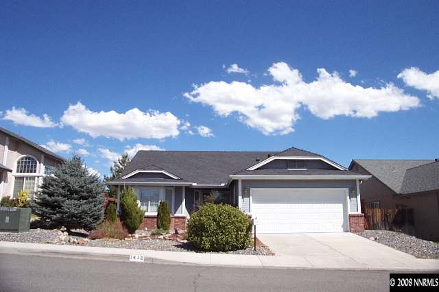 1418 Backer Way Reno, NV 89523 - Photo 1 of 9 a front view of a house with a yard