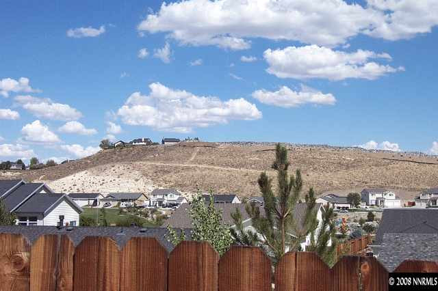 1418 Backer Way Reno, NV 89523 - Photo 2 of 9 a view of a city with sunset