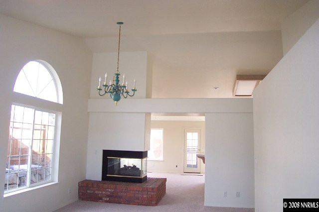 1418 Backer Way Reno, NV 89523 - Photo 5 of 9 a living room with furniture and a fireplace