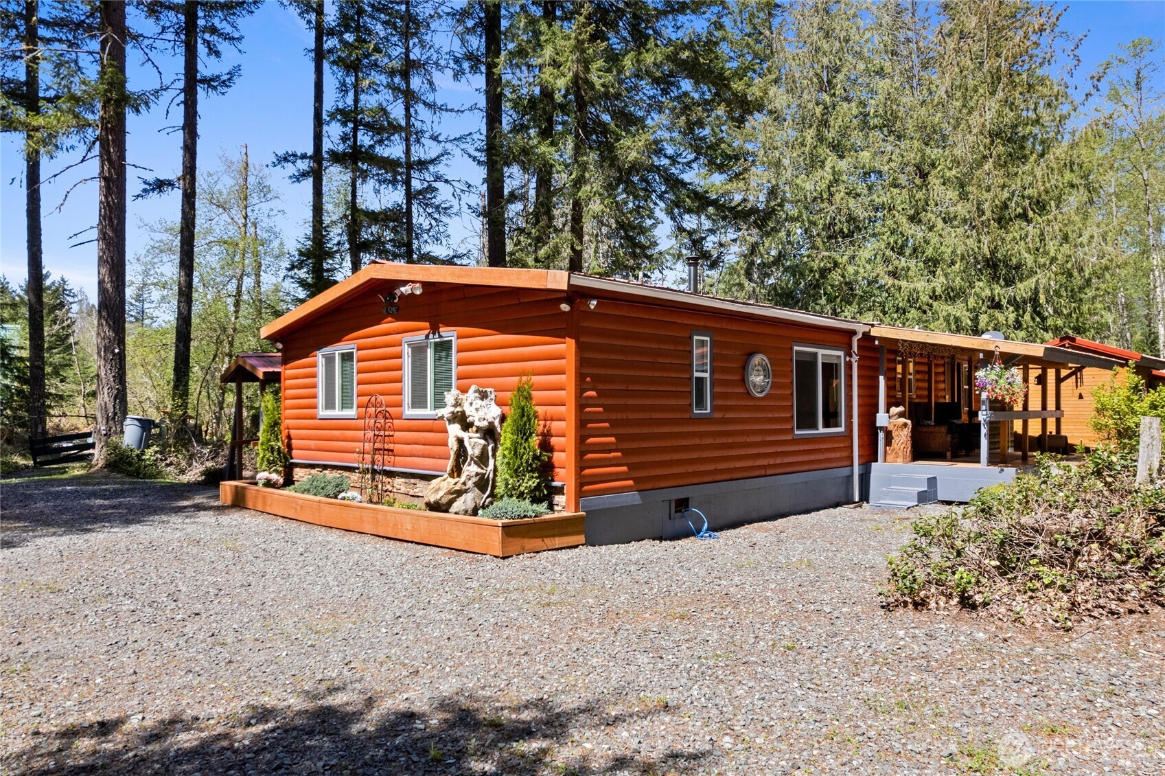a backyard of a house with barbeque oven