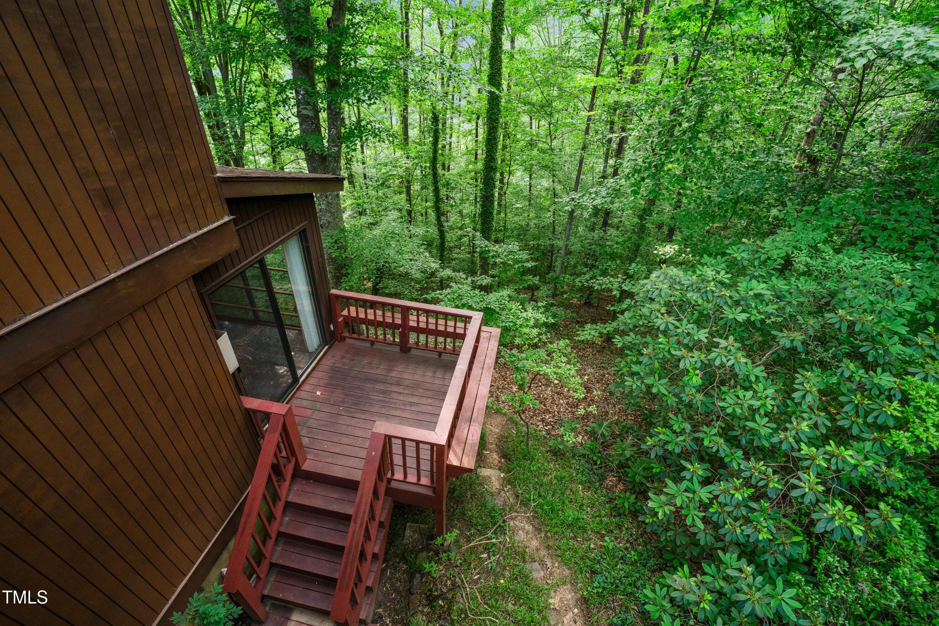 3416 Ocotea Street Raleigh, NC 27607 - Photo 3 of 7 a view of balcony with wooden floor and outdoor space