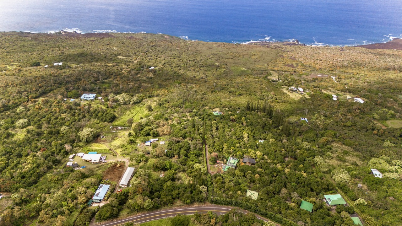 87-2721 Lot 2a Hawaii Belt Road Captain Cook, HI 96704 - Photo 2 of 17 a view of a city with an outdoor space