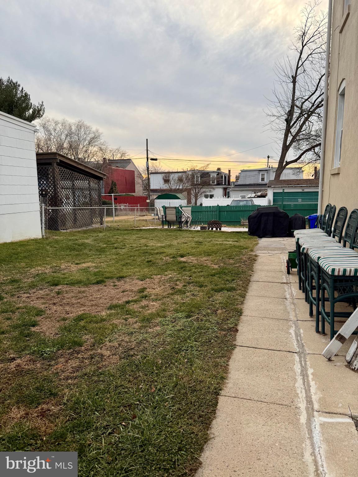 1246 Luzerne Street Reading, PA 19601 - Photo 2 of 4 a backyard of a house with table and chairs