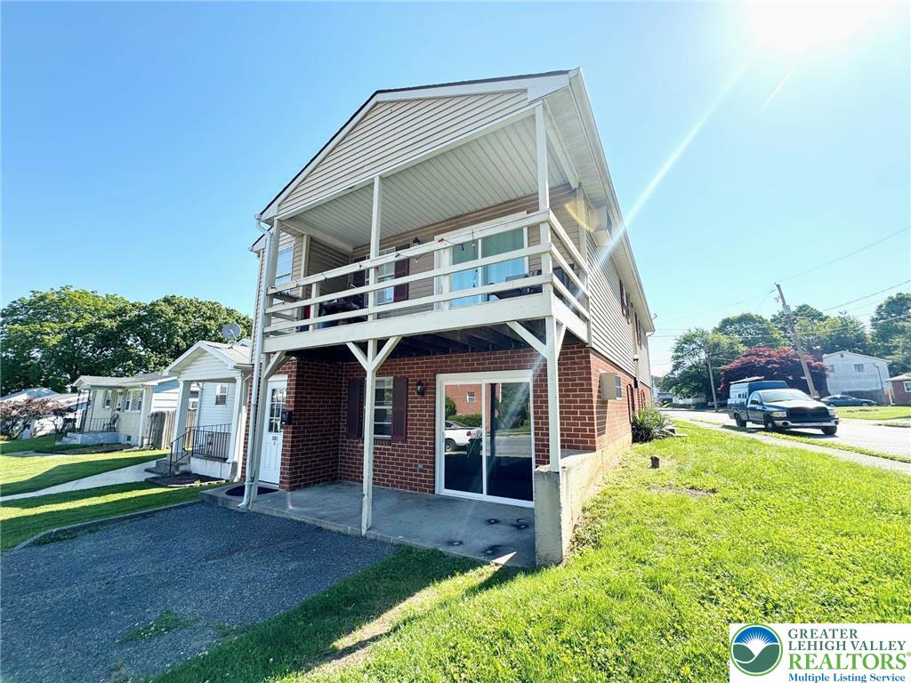 301 North Halstead Street, Unit #1 Allentown, PA 18109 - Photo 1 of 11 a view of a house with a yard