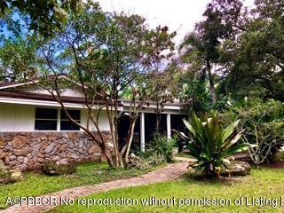 2762 F Road Loxahatchee, FL 33470 - Photo 2 of 25 a view of a house with a yard